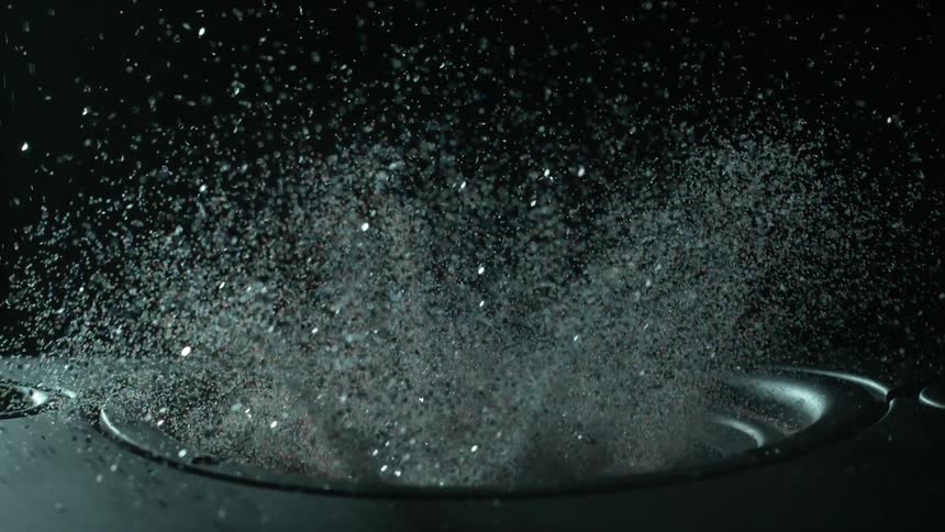 Abstract materials are coming out of a speaker