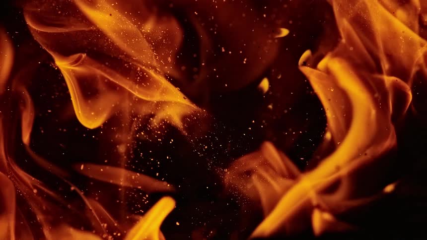 Flames and sparks burn into the air
