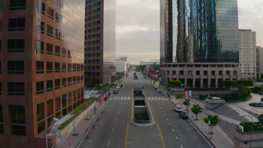 An aerial view of a downtown city is displayed