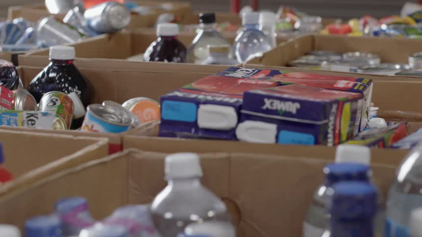 Groceries packed on cardboard boxes in a warehouse