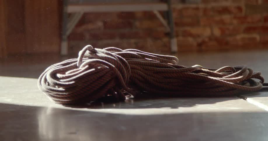Bundle of rope on cement floor