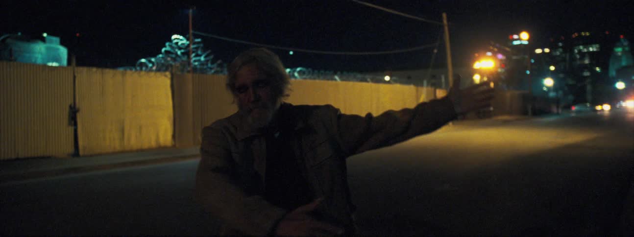 A man dances in the streets
