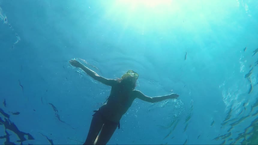 A woman soaks in the dive
