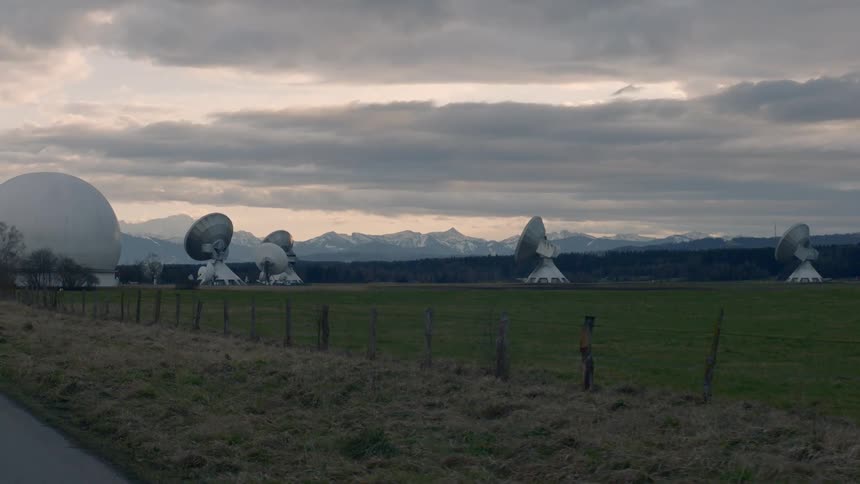 Radio telescopes sit in a wide open field