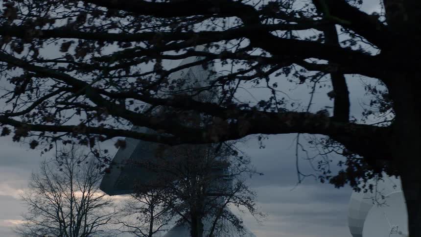 View of large radar at dusk