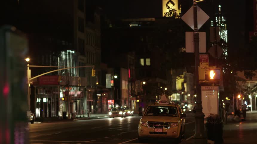 Taxis line a city street