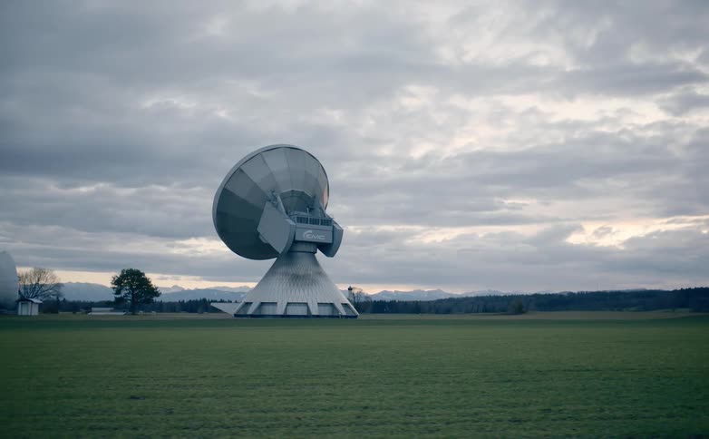 A large satellite in a field