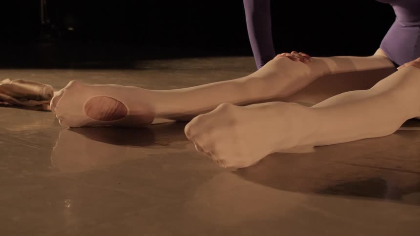 Ballet dancer stretching