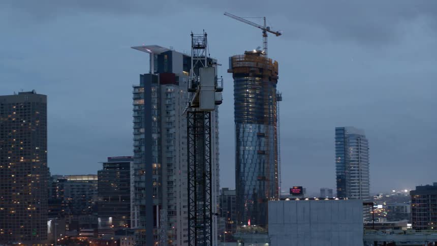Aerial view of building construction in Chicago at dusk