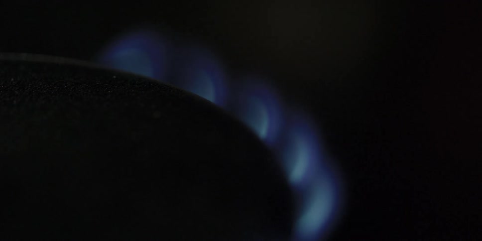 Flames come out of a stove burner