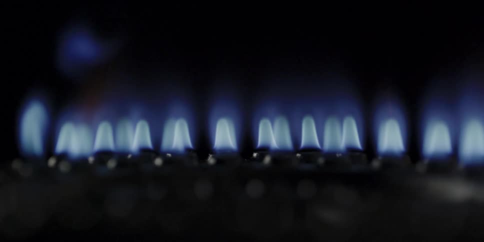 The light on the burner slowly flickers on