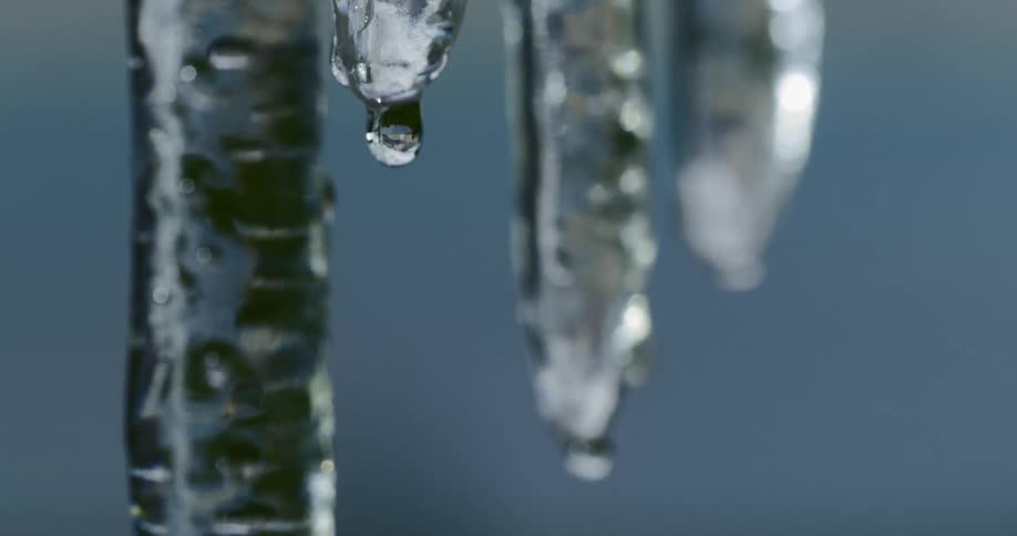 Icicles melt and droplets drop slowly