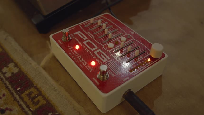 Pog2 polyphonic octave generator pedal lies on the ground