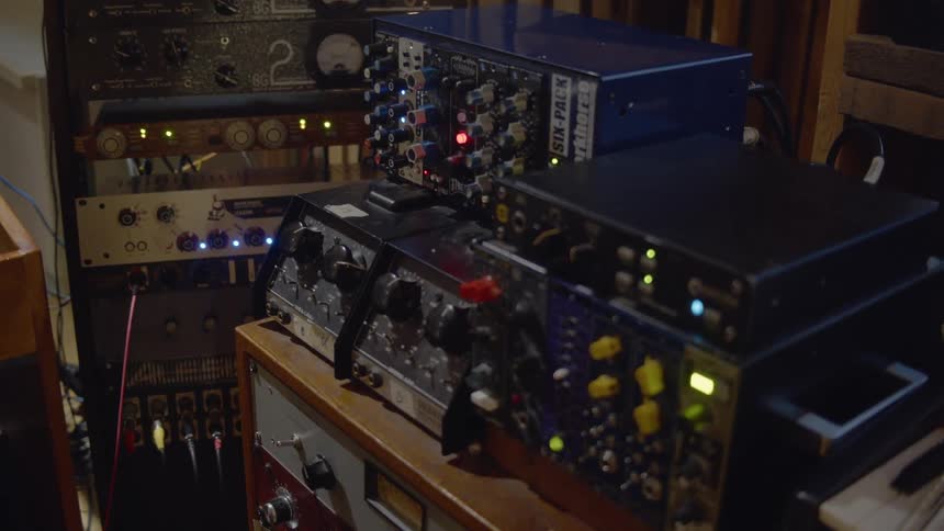 Audio equipment lights shine in a room