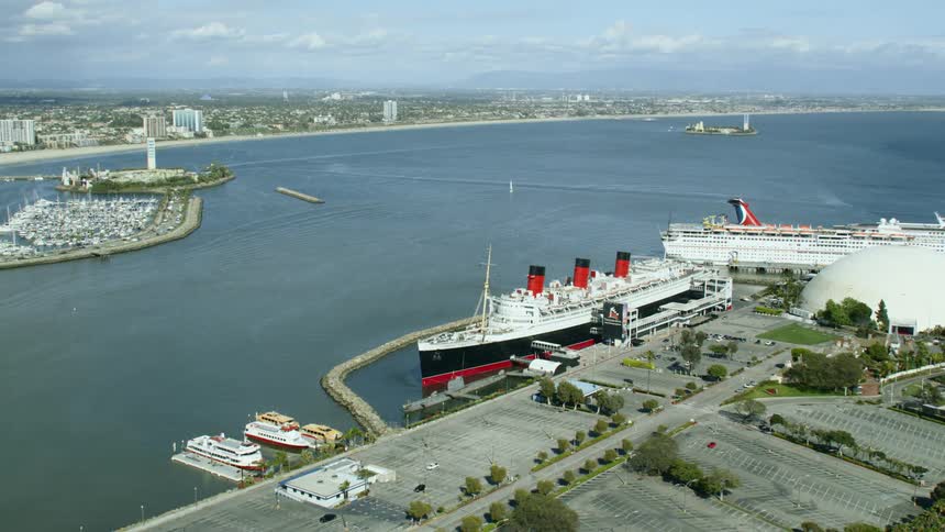 Cruise ships sit at a quiet port