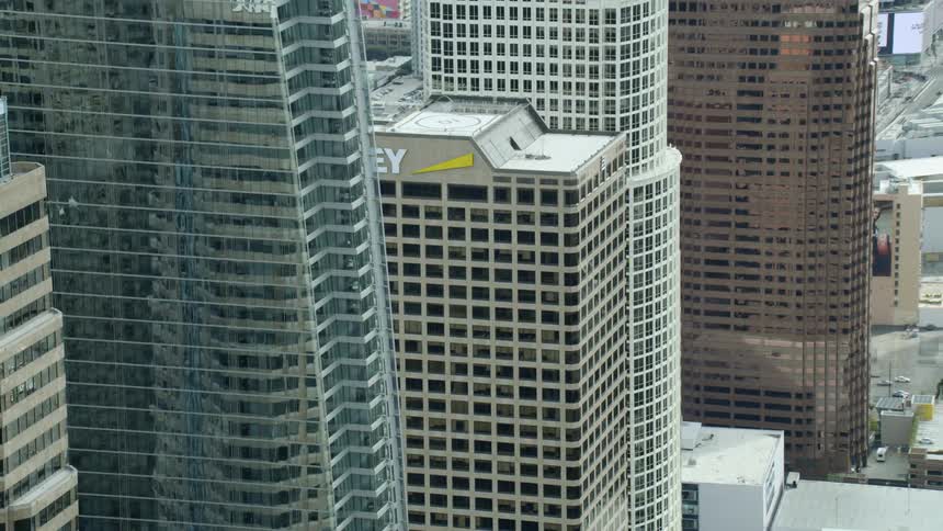 The stadium is in the center of the tall buildings