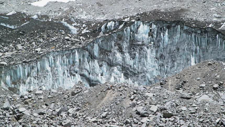 Crystals show through crevice in stone ground