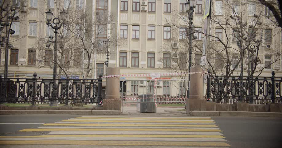 The gate is closed to the park ahead in the city