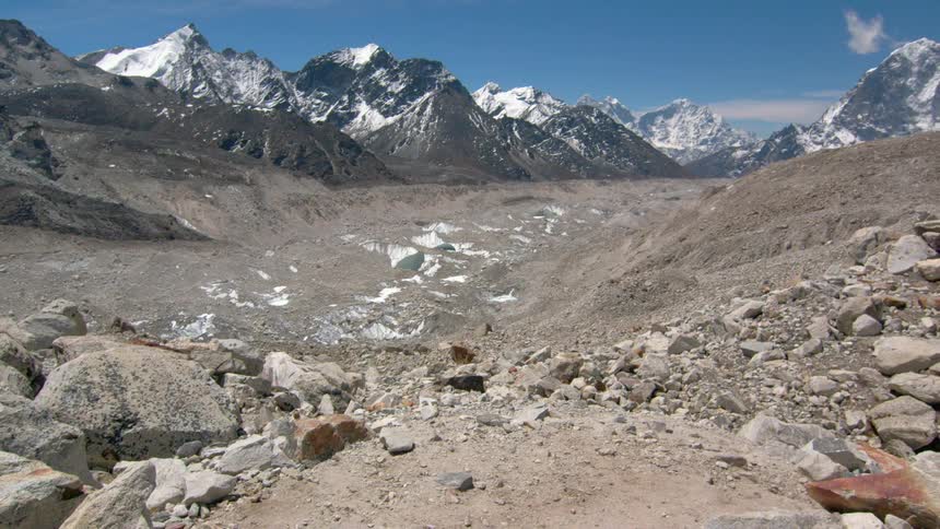 The hills are covered with rocks near the mountain