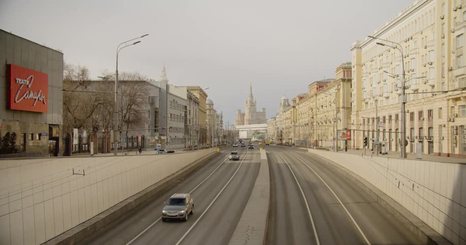 Cars travel on the freeway in the city