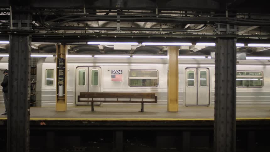 A subway pulling out of the station