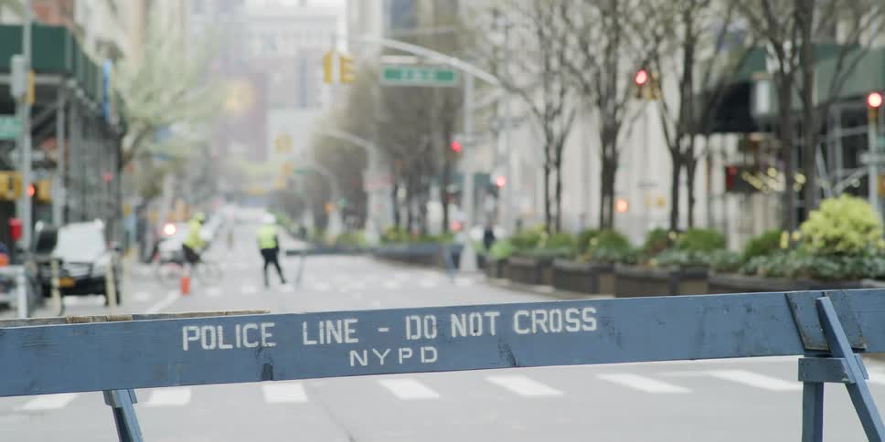 A police line on a busy new york street