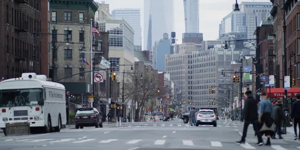 Pedestrians cross a city street