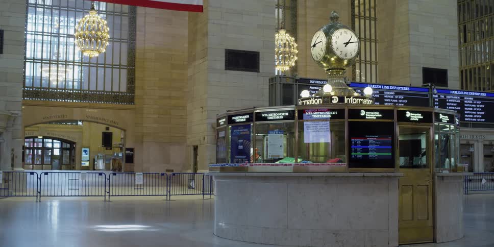 Central station customer service booth and surrounding room stand empty