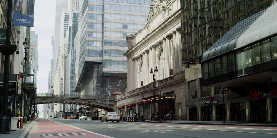 A city street with vehicles and buildings