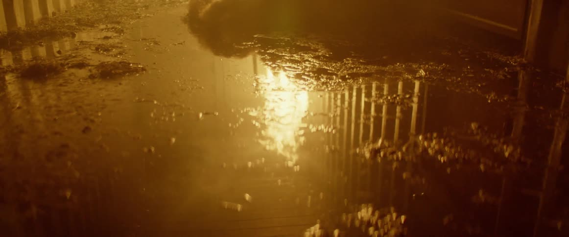Reflection in water of flame burning