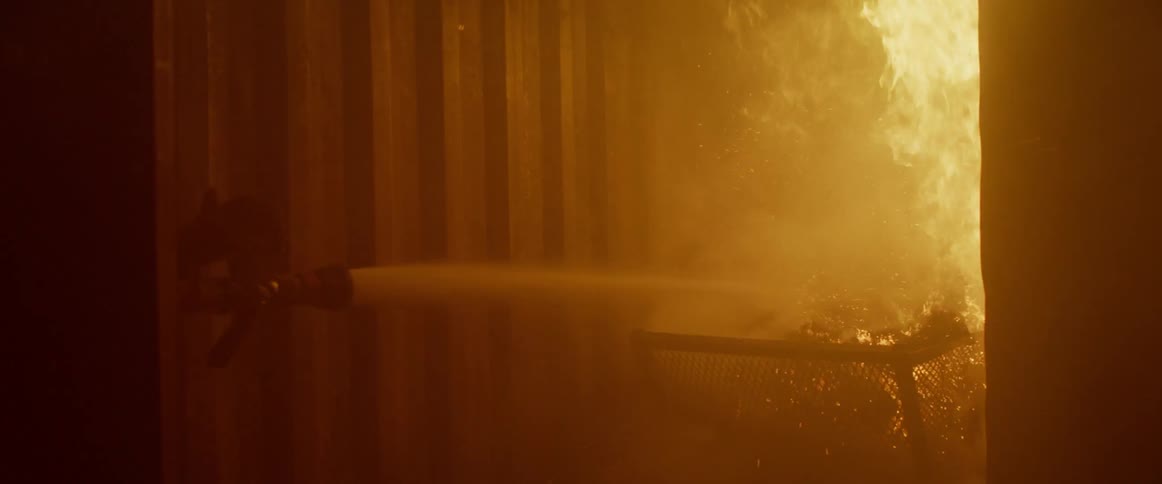 Firefighter extinguish fire inside container