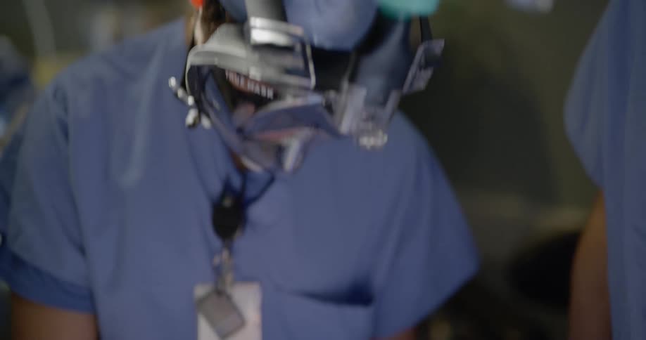 Doctors work on a patient together