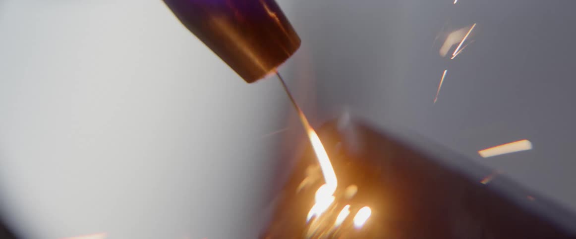 Sparks and flames are displayed