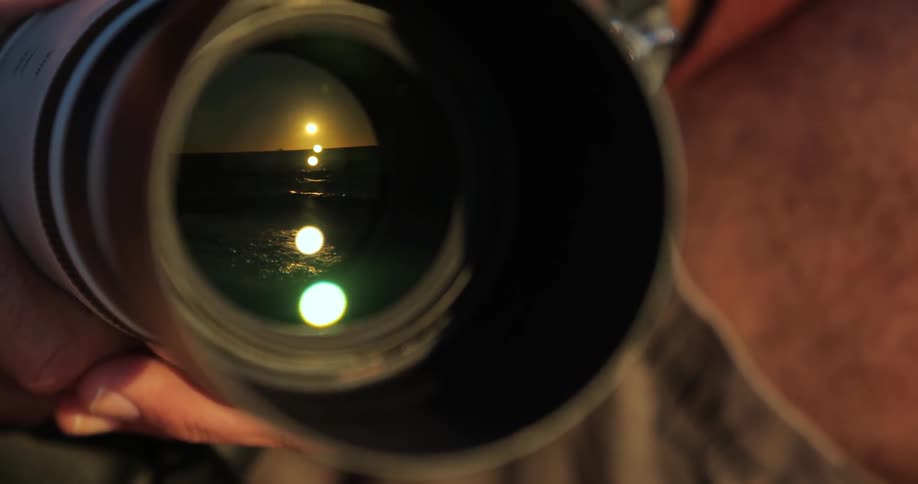 A camera capturing crashing waves