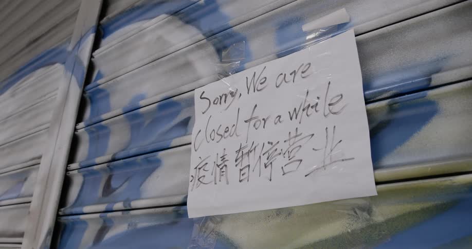 Closed sign taped to business door
