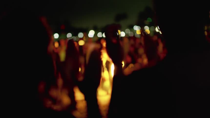 A flamethrower show in front of an audience