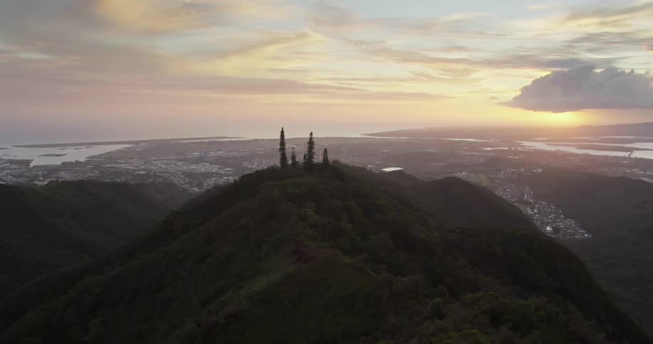 Aerial view of small town surrounded by lakes at sunset