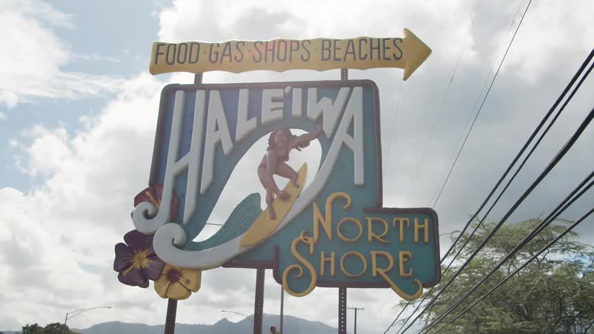 A sign at the entrance of a business