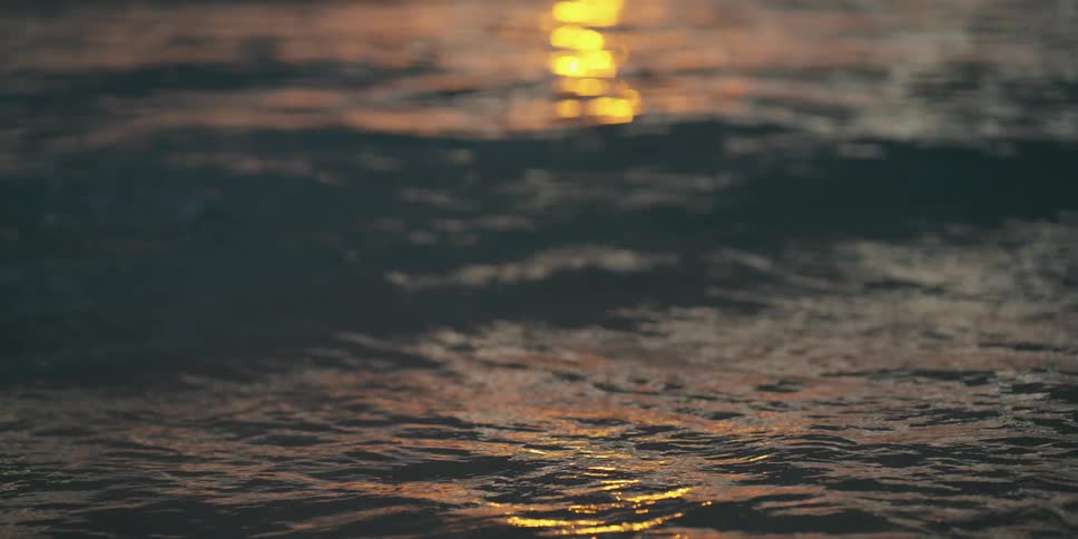 Ocean waves with the sunlight reflecting off the water