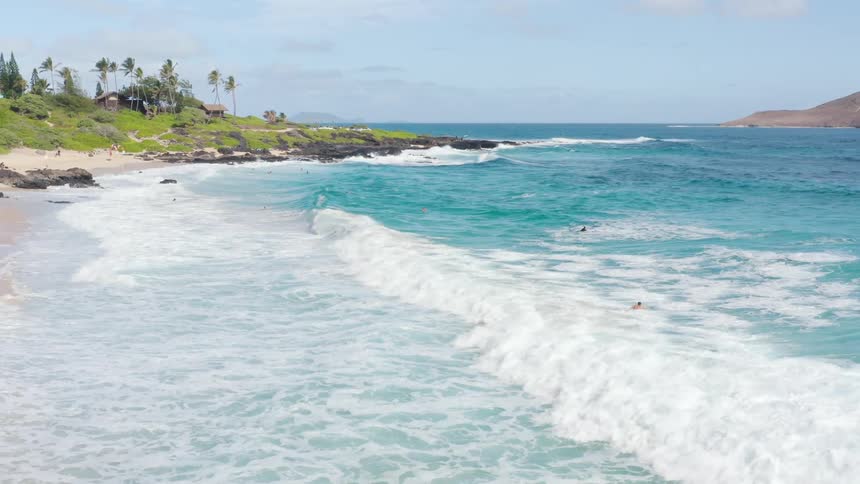 People playing in the ocean waves