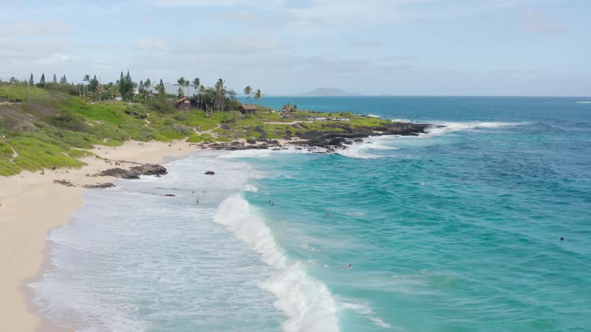 Ocean waves crash onto the shore