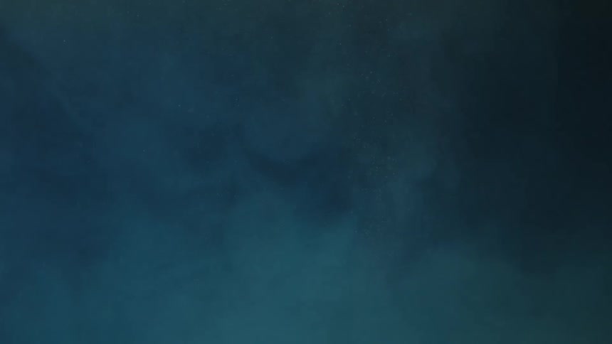 Blue and white colors that look like the sky and clouds with white specks that look like snow