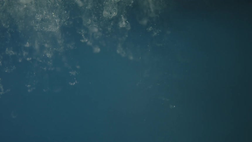 Blue and white that looks like water with ice sinking in it