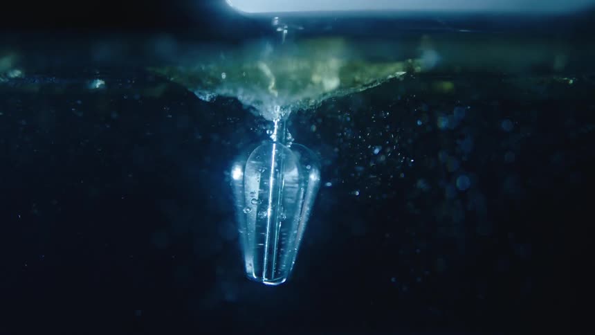 A mixer is spinning the water fast