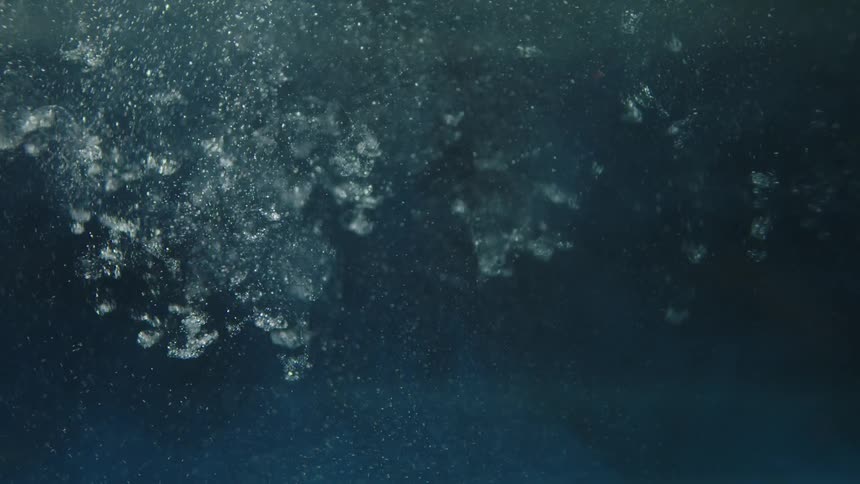 Water bubbles fall in the water