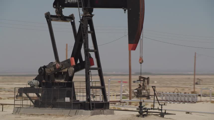 Pumpjacks extract crude oil from oil fields