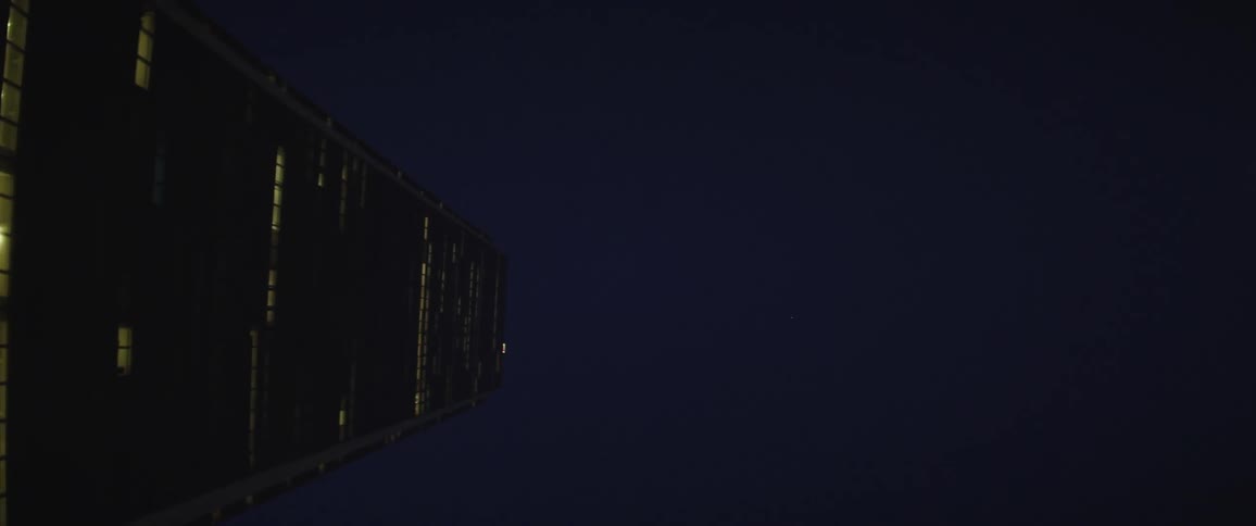 Worms eye view of skyscrapers at night