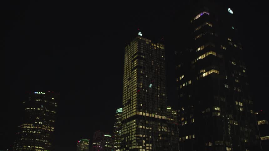 Skyscrapers in city at night