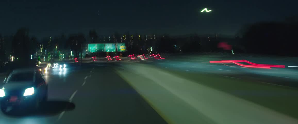 Time lapse of cars driving down a highway