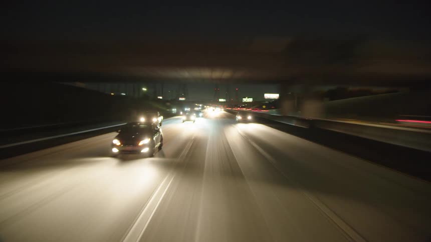 Cars drive on the highway